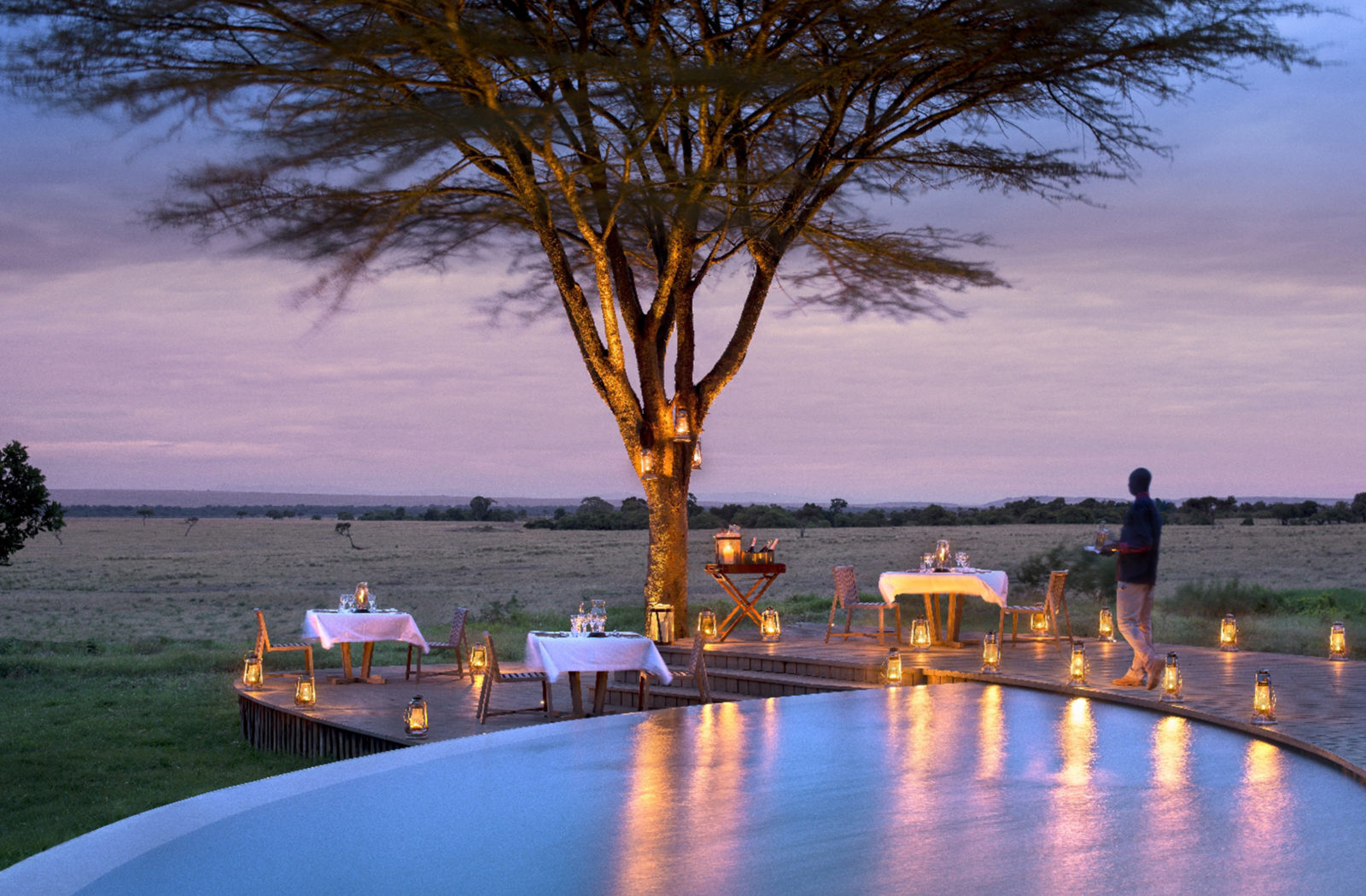 Poolside dining at &Beyond Bateleur Camp